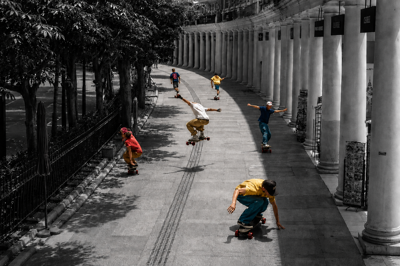 Skateboard riders on an Indian road